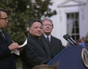Deng_Xiaoping_and_Jimmy_Carter_at_the_arrival_ceremony_for_the_Vice_Premier_of_China._-_NARA_-_183157-restored.jpg